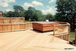 Cedar Spa Deck with Board and Batten/Lattice Privacy Rail and Sunburst Pattern Rail